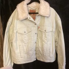 Gorgeous Light Green Levi’s Cropped Corduroy Jacket. Nwt’s, Snap Closure With Two Chest Pockets And Two Waist Pockets. Faux Fur Collar And A Comfy Quilted Lining. Size 1x, Pit To Pit 27”, Length 24”. 100% Cotton. Msrp $109.00 Cold Weather Cotton Denim Jacket, Spring Denim Jacket With Pockets For Cold Weather, Trendy Spring Outerwear With Corduroy Collar, Casual Denim Jacket For Spring Cold Weather, Trendy Winter White Cotton Outerwear, Levi's Cotton Outerwear With Corduroy Collar, White Outerwear With Corduroy Collar And Long Sleeve, White Long Sleeve Outerwear With Corduroy Collar, Casual White Outerwear With Corduroy Collar