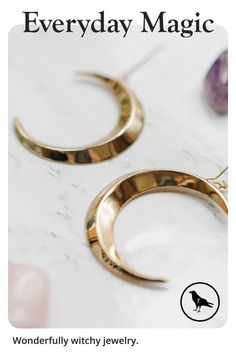 Gold Crescent Earrings With Moon Phase Detail, Modern Gold Moon Shaped Jewelry, Modern Gold Moon-shaped Jewelry, Gold Moon-shaped Metal Hoop Earrings, Gold Moon Shaped Metal Hoop Earrings, Gold Moon Shaped Hoop Earrings, Half Moon Phase Brass Earrings, Gold Crescent Hoop Earrings With Moon Phase, Gold Half Moon Shaped Metal Jewelry