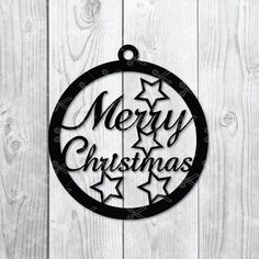 merry christmas ornament hanging on a wooden wall with stars and the words merry