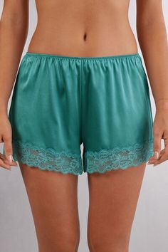 Shorts in light stretch silk satin embellished with a small lace ruffle. Undershirt Tank Top, Strapless Bralette, Womens Pajama Shorts, High Waisted Briefs, Strapless Bandeau, Corset Lingerie, Silk Shorts, Tank Top Camisole, Lace Ruffle