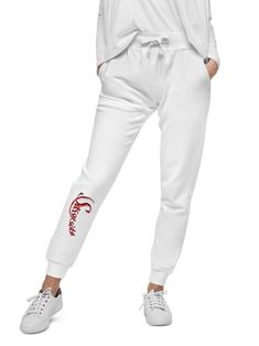 You can match these sweat pants with other sassy Sista fashions. Well-made and lined with fleece, these comfortable Unisex Fleece Sweatpants will be your first choice for a casual everyday outfit--all you need to add is a graphic tee and sneakers to finish off the look. * 100% cotton face * 65% cotton, 35% polyester * Charcoal Heather is 55% cotton, 45% polyester * Tightly knit 3-end fleece * 5-thread stitching * Cuffed and side-seamed legs * Elastic inside the waistband * Flat drawstrings in a Fleece Sweatpants With Letter Print For Loungewear, Fleece Joggers With Letter Print For Leisure, Leisure Fleece Sweatpants With Letter Print, Leisure Fleece Joggers With Letter Print, Casual Fleece Joggers With Letter Print, Leisure Fleece Bottoms With Letter Print, Athleisure Fleece Sweatpants With Letter Print, Trendy Fleece Joggers For Streetwear, Fitted Cotton Sweatpants With Letter Print