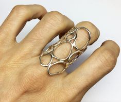 This is a sterling silver organic statement ring.This is an elegant ring which can be worn as an everyday ring.It has a shiny finish but it can be matt If you want.It is also available in rough finish in silver and gold plated silver: https://www.etsy.com/listing/258207731/gold-statement-ring-silver-organic-ring MATERIALS: sterling silver 925 DIMENSION:approximately the biggest dimension is 4 cm (1 5/8 in.) I can make this ring to your size.You can find your size by looking here: http://www.blue Sterling Silver Statement Ring, Big Silver Rings, Organic Shape Jewelry, Big Rings For Women, Architectural Rings, Statement Rings Unique, Funky Rings, Big Ring, Silver Statement Earrings