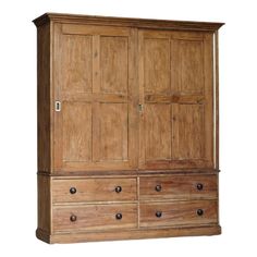 an old wooden armoire with many drawers