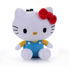 a hello kitty stuffed animal with a red bow on it's head