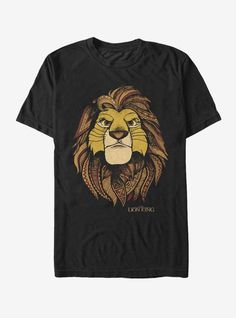 a black t - shirt with a lion's head on it