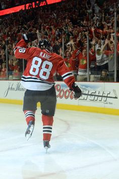 the hockey player is celebrating his team's win