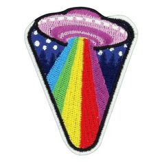 a patch with an image of a rainbow in the center and stars around it, on top of a white background