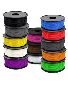 various colors of pla filamant spools are stacked on top of each other