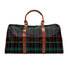 "This plaid travel bag is all about style. Made with high-grade waterproof fabric, it's a highly durable means of transferring your essentials wherever you go. With multiple compartments, a resilient carrying handle, and an adjustable shoulder strap, it's the perfect companion for all your adventures.  .: 100% high-grade PU leather .: One size: 20\" × 12'' × 9\" (50.8cm × 30.5cm × 23cm ) .: Brown PU leather handles and an adjustable shoulder strap .: Polyester lining .: Gold-colored zipper" Plaid Satchel Shoulder Bag For Travel, Plaid Rectangular Bag For School, Rectangular Plaid Bag For School, Rectangular Plaid Bags For School, Rectangular Plaid School Bag, Plaid Tote Bag For Travel, Large Capacity Plaid Travel Bags, Plaid Large Capacity Rectangular Bag, Plaid Rectangular Bag With Large Capacity