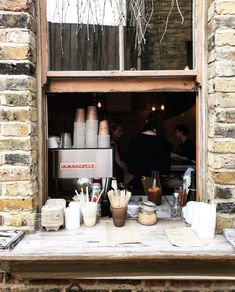 an open window with food on the counter