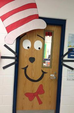 a door decorated to look like a cat in the hat