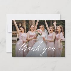 a thank card with the words thank you in white and pink on top of it