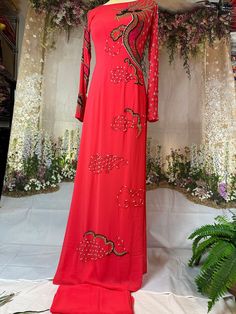 Brand New High Quality Vietnamese Ao Dai with Matching Pants.  Free Fast Priority shipping (1-3 days delivery) via USPS. Size Bust/ChestWaist S32in/81cm27in/68cm M33in/83cm28in/71cm L35in/89cm29in/74cm XL36.5in/93cm32in/81cm 2XL38in/96cm35in/89cm 3XL40in/102cm36in/91cm 4XL42in/107cm38in/96cm 5XL44in/112cm40in/102cm 6XL46in/117cm42in/107cm Ao Dai Length is 57-58in Pants length 44in  Please note:  Almost all Ao Dai have some sewing Chalk Marks because these are Brand New, unwashed Ao Dai.  Gently Embroidered Long Sleeve Ao Dai For Party, Summer Party Traditional Ao Dai, Floor-length Ao Dai For Festive Party, Festive Floor-length Ao Dai For Party, Ao Dai Vietnamese, Vietnamese Ao Dai, Fitted Suit, Matching Pants, Pants Length