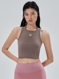 Composition : Outshell: Cotton 95%, Polyurethane 5%Color : SEPIA_S,SEPIA_MCountry of Origin : KOREA Brown Summer Workout Tops, Brown Stretch Sleeveless Crop Top, Brown Sleeveless Workout Top, Brown Sleeveless Sports Top, Brown Sports Tops For Summer, Sporty Brown Top For Spring, Sporty Brown Tops For Spring, Chic Sleeveless Sports Top, Spring Sleeveless Tank Top With Medium Support