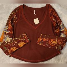 Free People Amara V-Neck Thermal Top Size Medium Cool Long Sleeve Is Featured In A V-Neck, Slightly Cropped, Thermal-Style Silhouette With Colorful Stitching And Embroidery At Sleeves. Fit: Staple, Relaxed Fit Features: Rounded Bottom Hem, Designed To Add A Touch Of Effortless Edge To Any Look, This Goes-With-Anything. Machine Wash Cold New With Tags! Brown Bohemian V-neck Top, Brown V-neck Tops For Fall, Black Tank Top Women, Long Sleeve Layer, Plaid Pullover, Thermal Top, Crop Top Hoodie, Ruffle Crop Top, Thermal Shirt