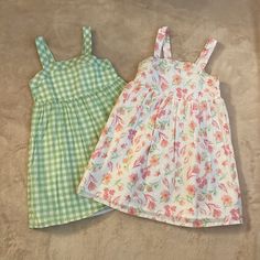 Cupcakes & Cashmere Girls Dresses Size 6. Both Dress Are Lined. First Dress Is White With Floral Print. The Second Dress Is White And Green Checked. Both Dresses Are Sleeveless. Brand New! *Will Not Sell Separate* Sweet Spring Dress For Picnic, Sweet Spring Dresses For Picnic, Sweet Spring Picnic Dress, Cute White Picnic Dress, Cute White Dress For Picnics, Cute White Dress For Picnic, Sweet Green Cotton Dress, Sweet Green Sleeveless Dress, Playful White Dress For Picnic