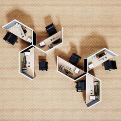 an overhead view of a living room and office space with furniture arranged in hexagonal shapes