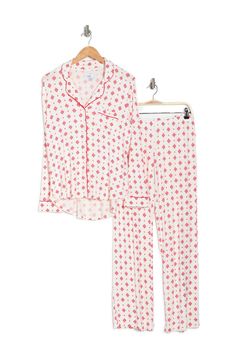 A soft jersey knit pajama set with a pretty print delivers feminine style and essential comfort. 2-piece set Shirt: 25" length (size S); Pants: 9.5" rise, 32" inseam (size S) Shirt: notch lapel, long sleeves, front button closures, chest patch pocket, allover print, contrast piping, knit construction Pants: elasticized waist, pull-on style, allover print, knit construction 95% rayon, 5% spandex Machine wash cold Imported Model’s stats for sizing: 5’11” height, 32” bust, 24” waist, 34” hips. Mode White Matching Set Sleepwear For Lounging, Printed Sets With Relaxed Fit For Lounging, Printed Relaxed Fit Sleep Sets, Printed Sets With Relaxed Fit For Sleep, White Printed Loungewear Sets, White Relaxed Fit Sets For Sleepover, Long Sleeve Printed Loungewear Sets, Long Sleeve Printed Lounging Sets, Printed Long Sleeve Lounging Sets