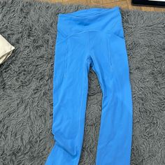 Lululemon Leggings 25” Size 4 In A Blue Color. Never Worn, In Good Condition Blue Functional Pants For Pilates, Functional Blue Pants For Pilates, Blue Full Length Yoga Pants For Running, Blue Activewear With Pockets For Gym, Sporty Blue Yoga Pants With Pockets, Blue Yoga Pants With Pockets In Athleisure Style, Blue Yoga Pants For Gym, Blue High Stretch Activewear With Pockets, High Stretch Blue Activewear With Pockets