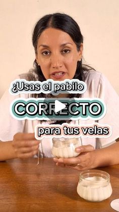 a woman sitting at a table with some food in front of her and the words correcto para tus velas