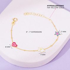 This magical unicorn charm bracelet is fit for a princess! Featuring multi-colored enamel on each of its charms, this bracelet is a happy burst of color that will brighten up any outfit. Made from 14k yellow gold, a material safe for sensitive skin, this bracelet measures 5 inches with an additional 1-inch extension, making it adjustable to fit her small wrist. The unicorn charms add a touch of whimsy to the bracelet, making it adorable for any little girl who loves all things magical. Give the Playful Gold Hypoallergenic Jewelry, Playful Hypoallergenic Gold Jewelry, Whimsical Multicolor Hypoallergenic Jewelry, Playful Hypoallergenic Jewelry For Birthday, Playful Hypoallergenic Charm Bracelet For Birthday, Kids Bracelet, Power Bracelet, Baby Necklace, Unicorn Charm