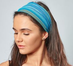 Unisex Blue & Green Striped Nepalese Cotton Headband by Antonia York D E S C R I P T I O N Our wide, easy to wear, unisex 'Ziggy' striped cotton bandana is a very versatile accessory; great for everyday wear, active-wear, and the beach. Please Note: The bandana is made from a woven cotton fabric with no stretch. If you prefer a more loose/relaxed fit you may want to try one of our jersey bandanas instead. Jersey is a knitted fabric with stretch. Content: 100% cotton Handmade by female artisans i Adjustable Blue Headband For Spring, Fitted Bandeau Headband In Casual Style, Fitted Blue Headband For Summer, Stretch Bandeau Headband For Summer, Summer Elastic Headband One Size, Adjustable Elastic Summer Headband, Trendy Summer Headband With Elastic Band, Fitted Blue Headband, Casual Blue Headband For Spring