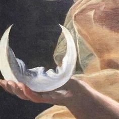 a painting of a hand holding a half moon