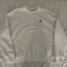 Brand New Never Worn! White Oversize Calvinklein Sweatshirt. It's Xs In Men's So Runs Pretty Big #Oversize #White #Sweatshirt #Brandnew #Calvinklein Calvin Klein Crew Neck Sweatshirt With Ribbed Cuffs, Calvin Klein Casual Crew Neck Sweater, Calvin Klein Relaxed Fit Sweatshirt For Fall, Calvin Klein Crew Neck Tops For Loungewear, Casual Calvin Klein Crew Neck Sweater, Calvin Klein Casual Tops With Ribbed Cuffs, Casual Calvin Klein Tops With Ribbed Cuffs, Calvin Klein Casual Tops For Loungewear, Casual Calvin Klein Tops For Loungewear