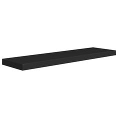 a black shelf sitting on top of a white wall