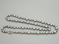 This Georgian Victorian Diamond or Moissanite Riviere Button Back Collet Tennis Necklace is a piece designed for daily admiration. Echoing the grace of historic riviere diamond necklaces favored by royalty, it features lab grown diamonds or moissanites set within Georgian cut-down collet settings. The rounded gold dome of the setting ensures that this necklace not only radiates elegance but also graces your skin with comfort, inviting you to embrace its beauty day by day. Handcrafted in blackene Beauty Day, Georgian Jewelry, Diamond Necklaces, Day By Day, Tennis Necklace, Brooch Jewelry, The Grace, Ring Bracelet, Lab Grown