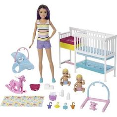 the doll is standing next to her crib and toys