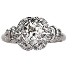 Item Details: Ring Size: 5.25 Metal Type: Platinum Weight: 3.3 grams Center Diamond Details GIA CERTIFIED Center Diamond - Certificate #5181221870 Shape: Old European Brilliant Carat Weight: 1.02 carat Color: J Clarity: VS2 Finger to Top of Stone Measurement: 5.61mm Platinum Engagement Ring, Platinum Diamond Engagement Rings, Platinum Diamond Rings, Blue Sapphire Diamond, Platinum Engagement Rings, White Gold Engagement, White Gold Engagement Rings, Three Stone Rings, Gold Engagement Rings