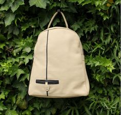 Designed Backpack for the girl on the go! #CampusBackpack #CollegeBag #BikeBackpack #BeigeLeather #beige #Beige&Black #zipBackpack #studentBackpack #laptop #macAir #mochilaUniversitaria #mochilaEstudiante #mochilaCuero #calfBackpack #LeatherBackpack #simpleShape #simpleDesign #StylishDesign #pockets #zipper #laptopBackpack #macAirBackpack  #multifunctionPockets #sacAdos #sacAdosCuir Beige Soft Leather Backpack For Everyday Use, Beige Soft Leather Satchel Backpack, Textured Leather Backpack For Daily Use, Luxury Leather Backpack With Textured Leather For Daily Use, Cream Leather Everyday Backpack, Everyday Cream Leather Backpack, Everyday Textured Leather Backpack, Textured Leather Backpack For Everyday Use, Beige Leather Travel Backpack With Zipper