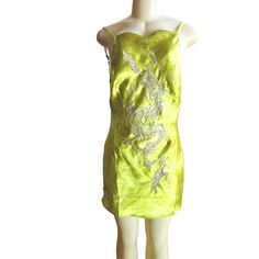 New With Tags, Cute Dress In A Lime Green Color. Spaghetti Adjustable Straps. Zips On The Side Of The Dress And Has A Gorgeous Sequenced Design In The Front Of The Dress. The Dress Is On The Shorter Side And Feels Like Silk. However, It Is Not Silk But 100 Percent Polyester. It Is A Washable Dress According To The Tag. In Nice Shape With The Tag Attached. Size S/P Measures As Follows Laid Flat, Bust, Armpit To Armpit, Is About 19" Waist Is About 17" On Each Side Length Is About 31" Green Camisole Slip Dress For Summer, Green Camisole Dress For Parties, Green Fitted Cami Slip Dress, Fitted Green Cami Slip Dress, Green Cami Mini Dress For Spring, Green Cami Dress For Party, Urban Outfitters Spaghetti Strap Mini Dress For Night Out, Fitted Green Cami Mini Dress, Urban Outfitters Mini Dress With Spaghetti Straps For Summer