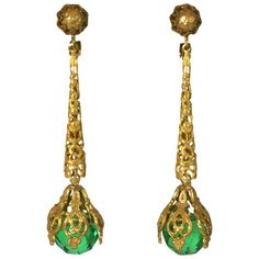 Miriam Haskell signature Russian Gilt filigree, and faceted faux emerald long earrings. Adjustable clip back fittings. Excellent Condition Length 3", Width .50" Gold Ear Jacket, Vintage Jewelry Ideas, Miriam Haskell Jewelry, Fake Earrings, Sabyasachi Jewellery, Ear Jacket Earring, Filigree Jewelry, Miriam Haskell, Earrings Inspiration