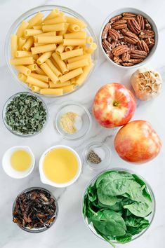 the ingredients for an apple cider salad laid out in bowls