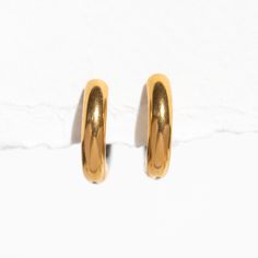 Switch up your look in our Duality Hoops! Boasting a unique and innovative gold and silver design, these earrings offer effortless versatility to match any outfit. With just a simple flip, you can switch up your look in an instant. Don't settle for just one metal color when you can have the best of both worlds.Our line of stainless steel hoops are made to be water and tarnish resistant. Wear this and feel confident wherever you go without having to worry about upkeep! Material: Stainless steel H Everyday Metal Cartilage Earrings Pair, Minimalist Everyday Gold Earrings, Minimalist Metal Plug Earrings For Everyday, Everyday Metal Cartilage Earrings With Matching Pair, Everyday Gold Tarnish-resistant Cartilage Earrings, Gold Minimalist Cartilage Earrings For Everyday, Trendy Everyday Gold Cartilage Earrings, Everyday Minimalist Gold Cartilage Earrings, Everyday Gold Metal Plug Earrings