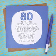 a blue and white birthday card with the words, 80 at your age on it