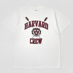 "- 1980s Harvard Rowing tee - Single stitch - Printed on Stedman Super Hi-Cru - Super bright & clean - Made in USA - 100% cotton - White    Men's MEDIUM fit (Tagged men's L) 28\" length 21\" chest   Excellent condition No flaws, stains or signs of wear. Very bright, sturdy and clean." College Crew Neck T-shirt With Letter Print, Cotton Crew T-shirt With Embroidered Graphics, White Varsity T-shirt With Screen Print, White Embroidered T-shirt For College, Retro Crew Neck Pre-shrunk Top, Crew Neck Cotton T-shirt With Embroidered Graphics, Cotton Crew Neck T-shirt With Embroidered Graphics, Vintage Relaxed Fit T-shirt For College, Collegiate Embroidered Crew Neck T-shirts