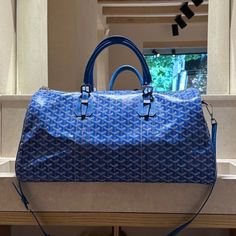 Goyard Bag Luxury Satchel Travel Bag For Errands, Designer Blue Satchel With Large Capacity, Luxury Tote Duffle Bag For Shopping, Luxury Tote Duffle Bag For Errands, Luxury Shopping Duffle Shoulder Bag, Luxury Duffle Bag For Shopping, Luxury Rectangular Duffle Bag For Errands, Luxury Top Handle Travel Bag For Errands, Luxury Travel Bag With Top Handle For Errands