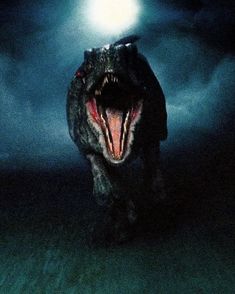 a large dinosaur with its mouth open and it's teeth wide open in the dark