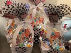 two baskets filled with items sitting on top of a table