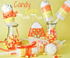 candy corn push pops are in glass jars