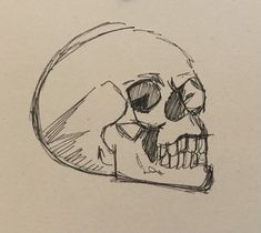 a drawing of a human skull with one eye open and the other half closed, sitting on top of a piece of paper