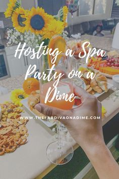 a person holding a wine glass with the words hosting a spa party on a vine