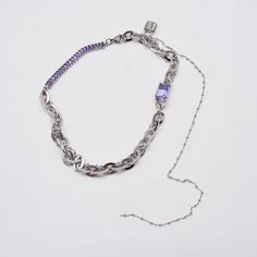 ✦ Embrace risk with this bold curb necklace, featuring purple baguette zircon, a half necklace, and a tassel chain. Make a statement with this unique accessory, perfect for those with an edgy and adventurous style. Complete any outfit with the lock pendant, adding a punk touch to your look. Don't be afraid to stand out at a cool costume party, the pink cz decoration will make you shine!----------- DETAILS ------------ Size (Length): 41.3cm- Color: Silver, Pink, Purple- Materials: Titanium, Cubic Trendy Purple Jewelry With Chain, Trendy Purple Clavicle Chain Necklace, Half Necklace, Lock Pendant, Y2k Necklace, A Punk, Don't Be Afraid, Cool Costumes, Be Afraid