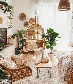 a living room with wicker furniture and plants