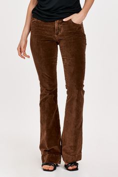 High rise flare leg jeans. It's the lovable fit that sits slightly lower on the waist and fitted skinny in the hips through the knee. Full inseam on stretch velveteen brushed for softness in designer color palettes, accented with wide hem opening.9 1/2" Front Rise (include waistband), 21" Leg Opening, 34" inseam (Size 27) 98% COTTON 2% SPANDEX Machine wash cold, Tumble dry low Imported Zip fly and button closure Five-pocket style Brown Relaxed Fit Mid-rise Jeans, Brown Flare Jeans For Fall, Mid-rise Brown Flare Jeans For Fall, Relaxed Fit Bottoms For Fall, Casual Straight Leg Flares For Fall, Brown Flare Jeans With Five Pockets, Fitted Brown Flare Jeans, Casual Brown Flare Jeans, Brown Cotton Flare Jeans For Fall