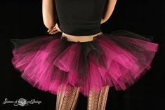 "Black and Fuchsia, Adult tutu, tulle skirt Layered petticoat style made in Sizes XS - Plus size. This tutu is handmade from around 35 yards, three layers of tulle. The top layer is 12\" black and the bottom two layers are a 12\" roll of Fuchsia of soft bridal tulle. All tulle is tightly machine gathered, layered, serged, and sewn to the black fabric covered elastic waistband. This tutu is fully sewn, never tied. It is machine washable and dryer safe. Please note this tutu is short made at 12\" Pink Fitted Halloween Skirt, Stretch Ballet Petticoat For Party, Fitted Purple Petticoat For Party, Pink Fitted Skirt For Alternative Fashion, Fitted Tutu Dress With Attached Cancan For Costume Party, Pink Fitted Tutu Dress For Halloween, Fitted Dance Petticoat, Pink Fitted Petticoat For Dance, Fitted Pink Petticoat For Dance