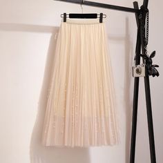 High Waist Mesh Tulle A Line Mid Calf Pleated Skirt
Note

Front with beadings. Back no beadings.

Our "One Size" normally fits: Russian Size: 40-48; US Size: 2-10; Europe Size 34-42; UK/AU Size 6-14.

 

Size Chart(cm)

One Size: Waist(stretch) 56-86, Length 76

Size chart is the results of flat measuring actual clothes which may exist 1-3 cm errors due to manual measuring.











 

Blue-Gray



Beige



White



Black



Pink Embellished Long Skirt For Spring, Spring Embellished Stretch Skirt, Spring Stretch Embellished Skirt, Elegant Beaded Skirt For Summer, Elegant Beaded Summer Skirt, Embellished White Skirt For Summer, Summer Embellished White Skirt, Beige Pleated Skirt For Summer Party, Fitted Beaded Skirt For Spring